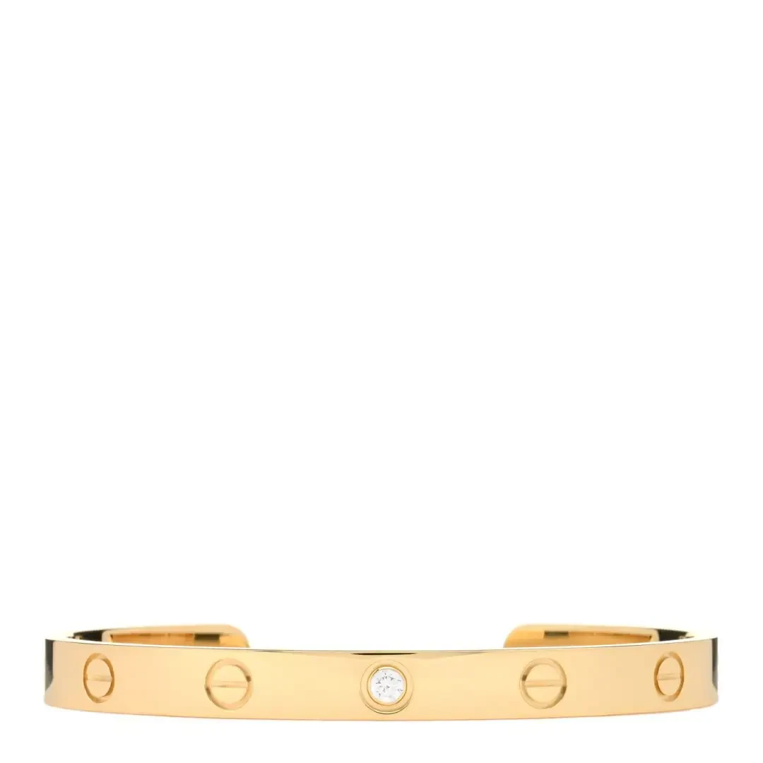 Cartier Bracelet manchette LOVE en or jaune 18 carats et 1 diamant