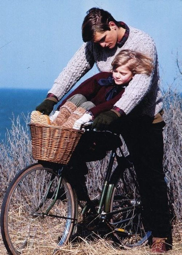 Old Money father and daughter enjoying a bike ride.